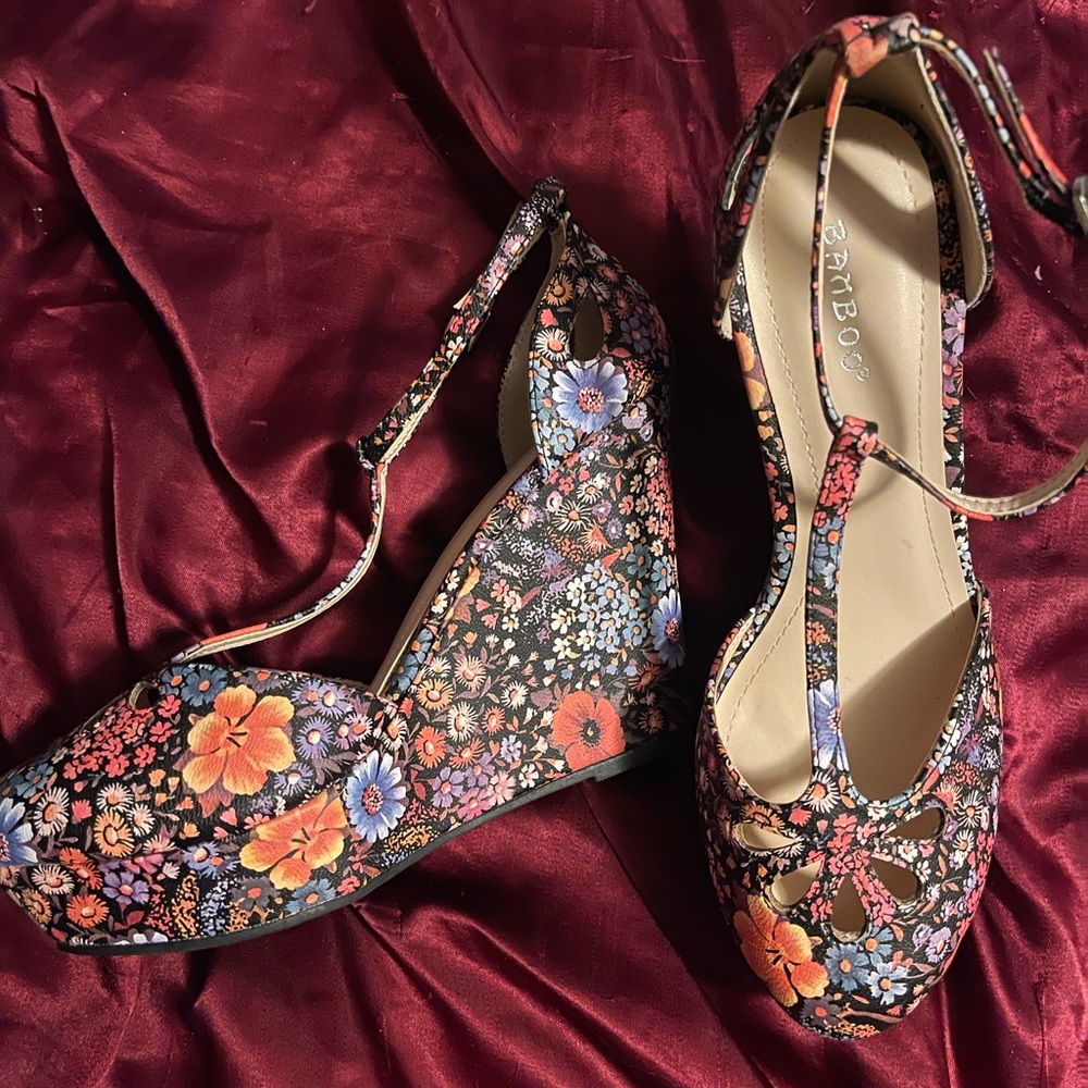 Never worn beautiful floral wedges!!!